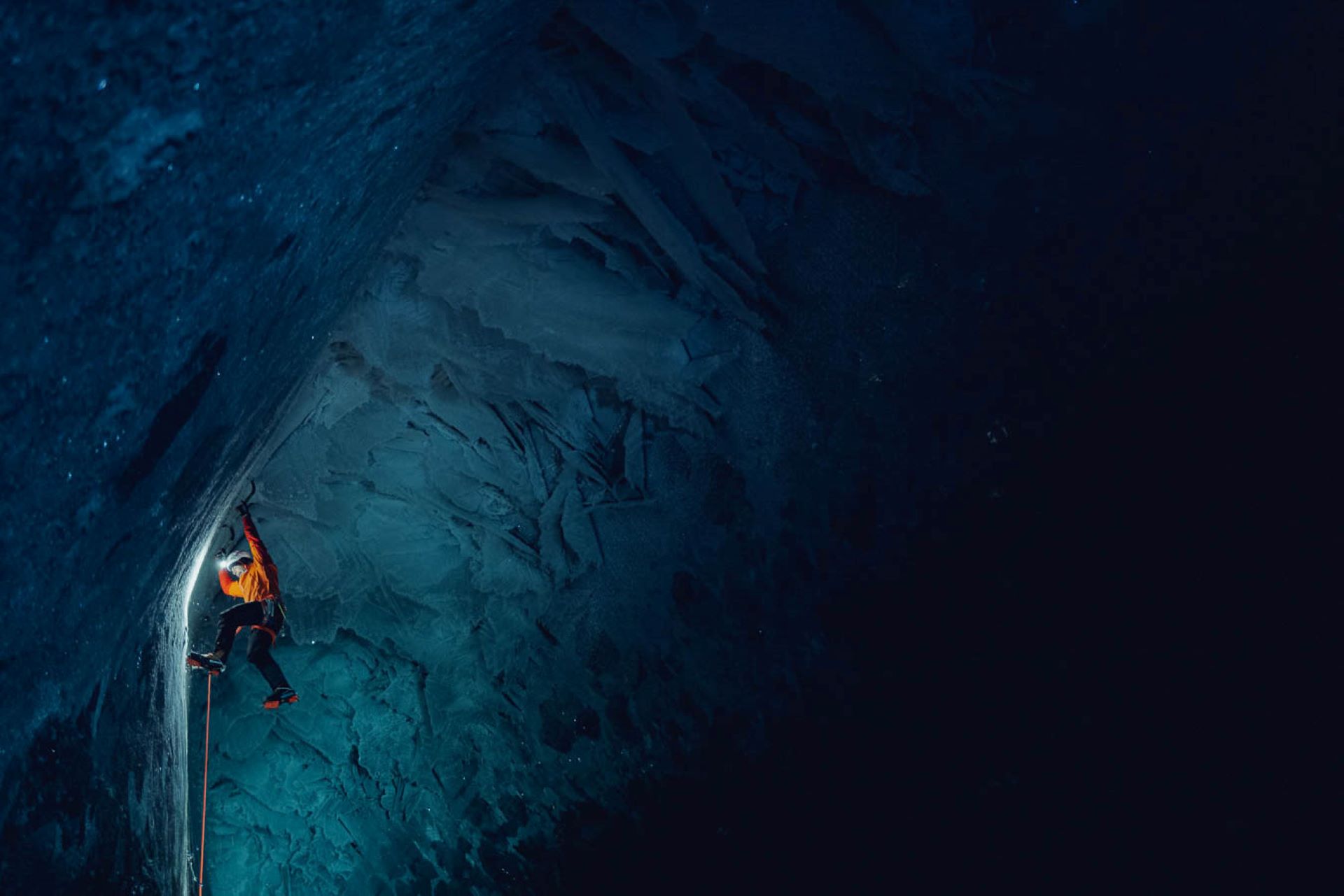 Dani Arnold climbing in an ice cave in Svalbard